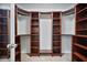 Spacious walk-in closet with custom shelving and ample storage space at 880 Crossfire Nw Rdg, Marietta, GA 30064