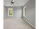 Spacious bedroom featuring neutral carpeting and a ceiling fan with overhead lighting at 1754 Heights Nw Cir # 11, Kennesaw, GA 30152