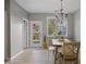 Inviting dining area featuring hardwood floors, natural light, and convenient access to the backyard at 1754 Heights Nw Cir # 11, Kennesaw, GA 30152