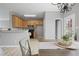 Well-equipped kitchen with wood cabinets, modern appliances, and a convenient breakfast bar at 1754 Heights Nw Cir # 11, Kennesaw, GA 30152