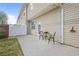 Concrete patio featuring outdoor seating and view of fenced yard at 1754 Heights Nw Cir # 11, Kennesaw, GA 30152