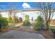 View of backyard with patio and landscaping at 2572 Avery Park Cir, Doraville, GA 30360