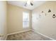 Cozy bedroom with neutral carpet, a window, and simple decor at 2572 Avery Park Cir, Doraville, GA 30360