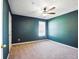 Bedroom featuring carpet flooring and a ceiling fan at 2572 Avery Park Cir, Doraville, GA 30360