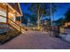 Brick driveway featuring a landscaped yard, exterior lighting, and a charming home in the background at 1060 Mcdaniel Sw St, Atlanta, GA 30310