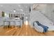 Spacious open-concept interior with a sleek staircase and stylish decor at 1060 Mcdaniel Sw St, Atlanta, GA 30310