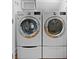A clean laundry room with modern washer and dryer units at 1060 Mcdaniel Sw St, Atlanta, GA 30310