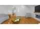 Hardwood floors and chic decor adorn this stylish living room with fireplace at 1060 Mcdaniel Sw St, Atlanta, GA 30310