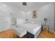 Stylishly decorated bedroom with modern decor, hardwood floors, and access to the ensuite bathroom at 1060 Mcdaniel Sw St, Atlanta, GA 30310