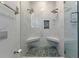 This luxurious walk-in shower features double shower heads and stone mosaic flooring and seating at 1060 Mcdaniel Sw St, Atlanta, GA 30310