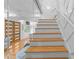 Elegant staircase showcasing hardwood steps and white wood risers at 1060 Mcdaniel Sw St, Atlanta, GA 30310