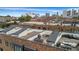 An aerial view displays multiple rooftop decks and the stunning cityscape at 267 Castleberry Station Sw Dr, Atlanta, GA 30313