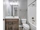 Stylish bathroom with modern fixtures, a vanity with storage, and a shower-tub combination, providing a serene retreat at 267 Castleberry Station Sw Dr, Atlanta, GA 30313