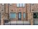 Brick exterior with modern windows and a private balcony at 267 Castleberry Station Sw Dr, Atlanta, GA 30313