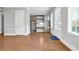 Office space with custom built-in shelving and cabinetry, with natural light from a nearby window at 267 Castleberry Station Sw Dr, Atlanta, GA 30313
