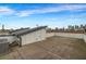 Enjoy city skyline views from this rooftop deck, perfect for outdoor living and entertaining at 267 Castleberry Station Sw Dr, Atlanta, GA 30313