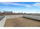 An expansive rooftop deck is ready for customization, with stunning city views at 267 Castleberry Station Sw Dr, Atlanta, GA 30313