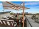 A stylish rooftop deck features elegant patio furniture and a breathtaking city skyline view at 267 Castleberry Station Sw Dr, Atlanta, GA 30313