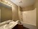 Bathroom with single sink vanity and tub/shower combo at 4302 Sorrells Dr, Powder Springs, GA 30127