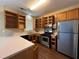 Functional kitchen featuring stainless steel appliances and ample cabinet space at 4302 Sorrells Dr, Powder Springs, GA 30127