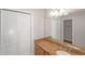 Bathroom featuring granite countertops, white cabinets, and updated fixtures at 602 Abingdon Way, Atlanta, GA 30328