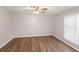 Bedroom featuring wood-look flooring and a ceiling fan at 602 Abingdon Way, Atlanta, GA 30328