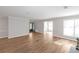 Spacious living room with wood-look floors, neutral paint, and natural light at 602 Abingdon Way, Atlanta, GA 30328
