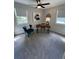 Bedroom area with gray carpet and natural light, featuring modern decor at 2747 Santa Barbara Nw Dr, Atlanta, GA 30318