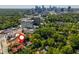 Scenic aerial view of property location near Atlanta skyline, surrounded by mature trees and with easy access to urban amenities at 8 Collier Nw Rd # B2, Atlanta, GA 30309