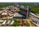 High angle view of a building near a hospital showcasing nearby medical facilities, local neighborhood and mature surrounding trees at 8 Collier Nw Rd # B2, Atlanta, GA 30309