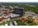Aerial view showcasing buildings, green landscape, and streets near the community at 8 Collier Nw Rd # B2, Atlanta, GA 30309
