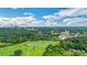 Scenic view showcasing the golf course, lush trees and landscape with a cityscape backdrop at 8 Collier Nw Rd # B2, Atlanta, GA 30309