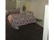 A cozy bedroom featuring a bed, decorative pillows and large closet at 855 Peachtree Ne St # 1912, Atlanta, GA 30308