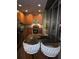 Stylish kitchen with granite island, stainless steel appliances, and a scenic skyline view at 855 Peachtree Ne St # 1912, Atlanta, GA 30308