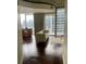 Open living space with hardwood floors, city views, and modern furnishings at 855 Peachtree Ne St # 1912, Atlanta, GA 30308