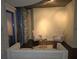 Bright living room featuring a modern sofa and chairs at 855 Peachtree Ne St # 1912, Atlanta, GA 30308