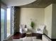 Stylish living space showcasing a modern design, city views, and plenty of natural light at 855 Peachtree Ne St # 1912, Atlanta, GA 30308