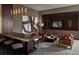 Comfortable lounge area with a bar, TV and modern decor at 855 Peachtree Ne St # 1912, Atlanta, GA 30308