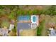 Aerial view of tennis court and pool with parking at 13 Sherman Nw Ln, Cartersville, GA 30121