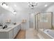 Spacious bathroom features double sinks, a glass shower, and a large soaking tub at 13 Sherman Nw Ln, Cartersville, GA 30121