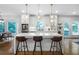 Modern kitchen featuring white cabinetry, a spacious center island, and stainless steel appliances at 13 Sherman Nw Ln, Cartersville, GA 30121