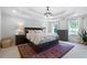 Tranquil main bedroom with tray ceilings, neutral color palette, and lots of natural light at 13 Sherman Nw Ln, Cartersville, GA 30121