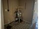 Utility room featuring the hot water heater at 144 Flat Rock Rd, Oxford, GA 30054