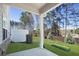 Landscaped backyard featuring a covered patio and lush greenery, great for outdoor enjoyment at 2540 Ravencliff Dr # 155, Austell, GA 30168