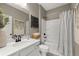 Bathroom featuring a vanity, sink, toilet, mirror and shower/tub combo at 2540 Ravencliff Dr # 155, Austell, GA 30168
