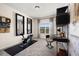 Bright bedroom featuring large windows, a modern desk, and a sleek shelving unit at 2540 Ravencliff Dr # 155, Austell, GA 30168
