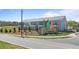 Beautiful exterior view of the Ellison Square townhome community with colorful flags at 2540 Ravencliff Dr # 155, Austell, GA 30168