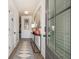 Inviting foyer with wood-look floors and a view of the hallway to the rest of the home at 2540 Ravencliff Dr # 155, Austell, GA 30168
