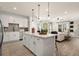 Open-concept kitchen with a large island, modern appliances, and lots of natural light at 2540 Ravencliff Dr # 155, Austell, GA 30168
