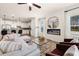 Open-concept area: electric fireplace, access to kitchen, and inviting furnishings to enhance comfortable living at 2540 Ravencliff Dr # 155, Austell, GA 30168